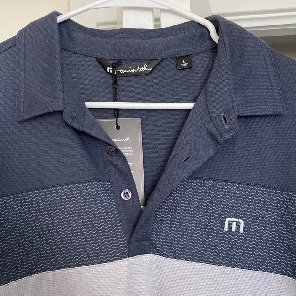 Travis Mathew Men’s Golf Polo Size Large. Brand new with tags.